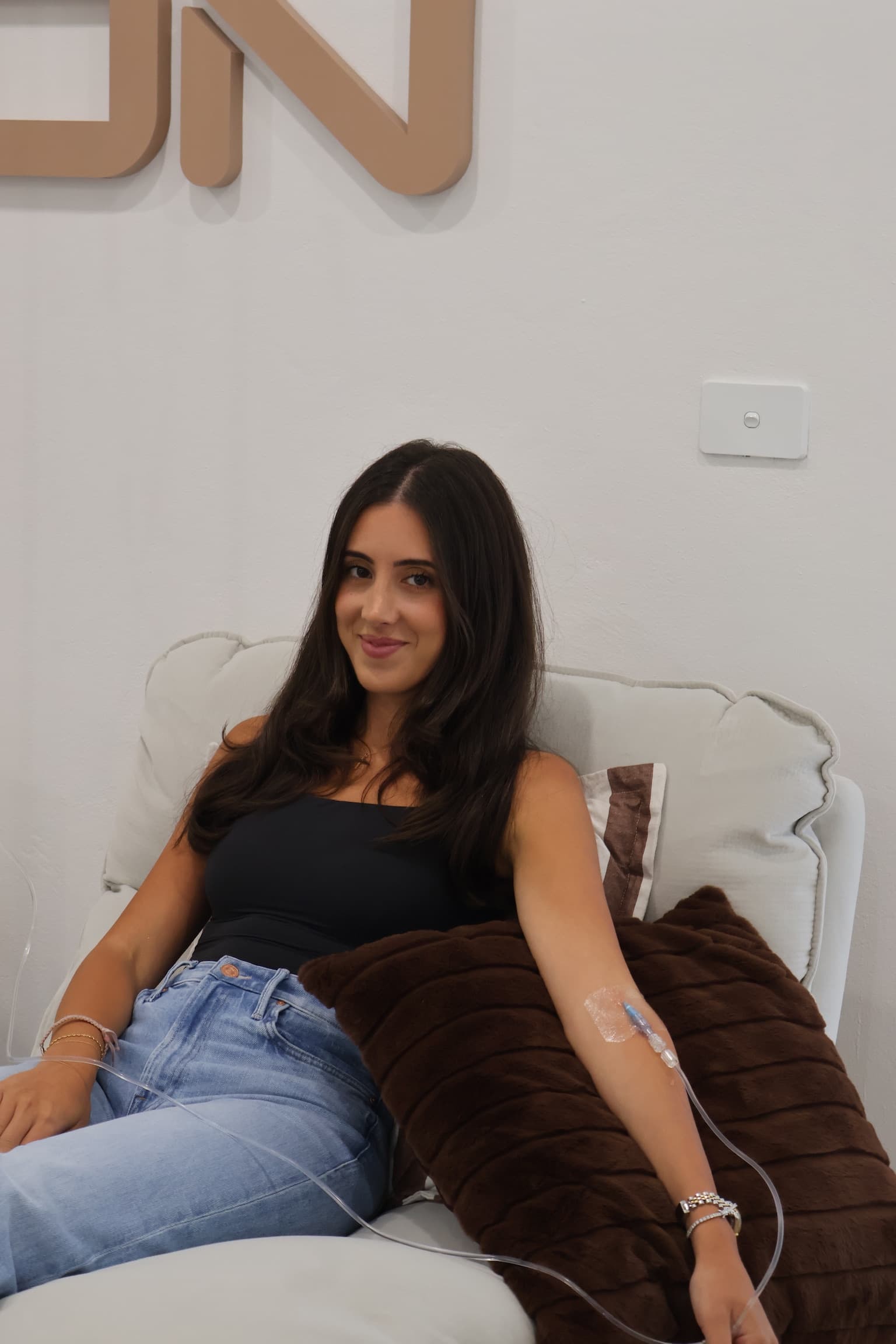 Client receiving IV therapy