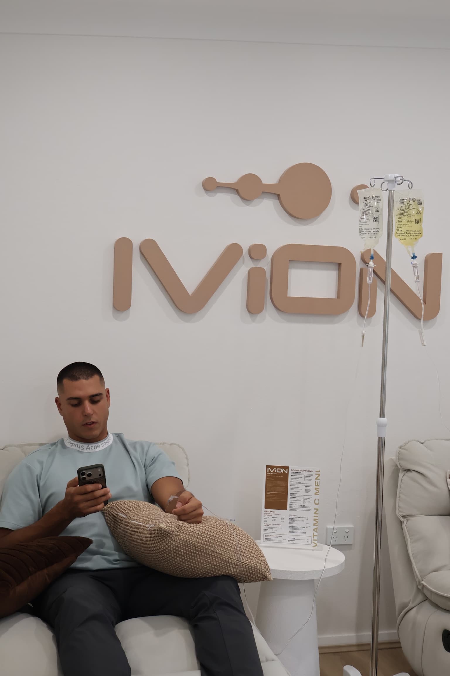 Client on phone with IVION logo